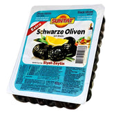 A 400g plastic pack of Suntat Black Olives, with label images of black olives and lemon, offers authentic Mediterranean flavor and product details.